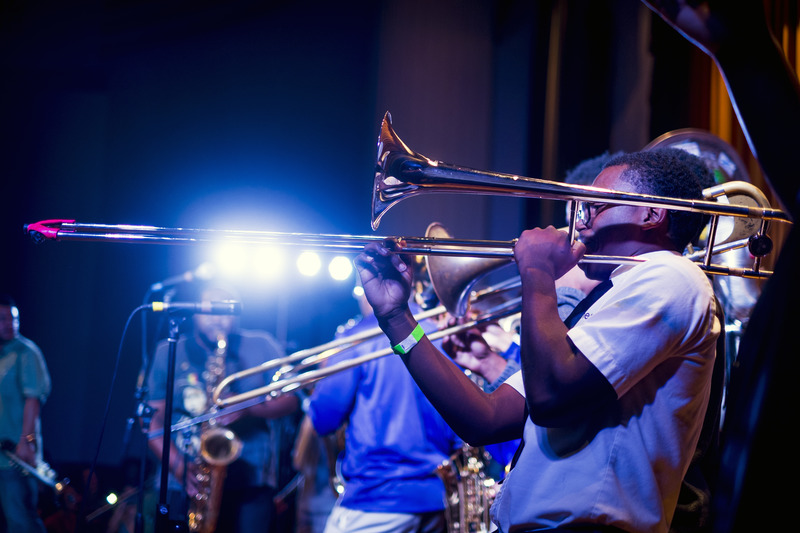 Jazz band trombonist performs onstage