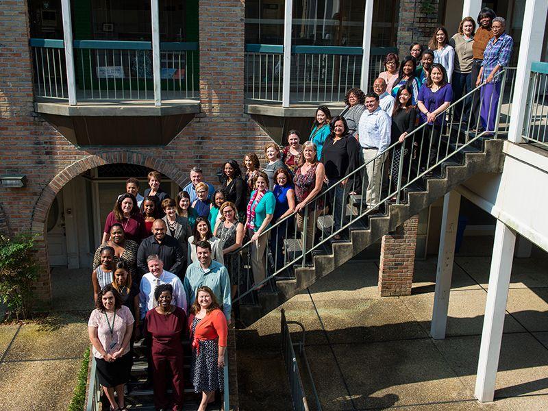 Group photo of Human Resources staff on the stairs at University Square