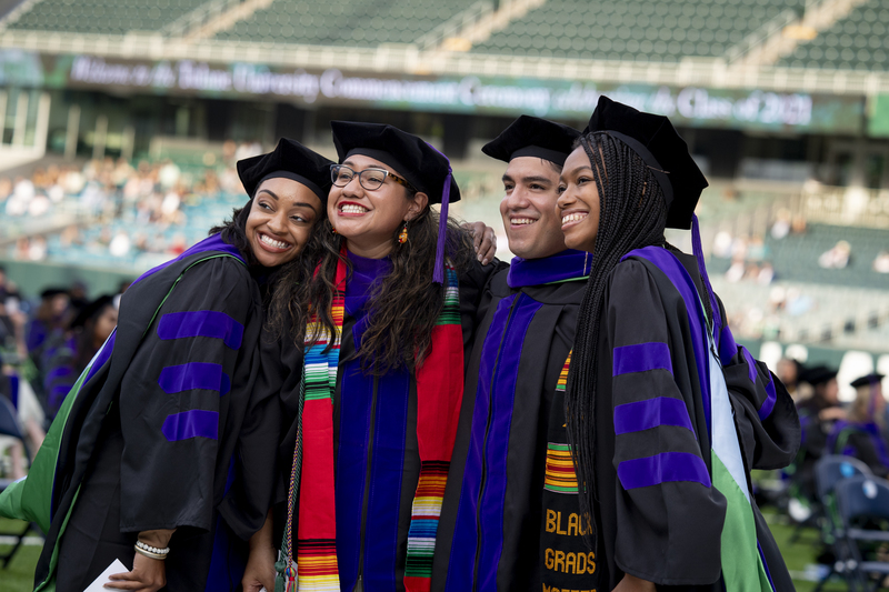 Law graduates pose for photo after Commencement