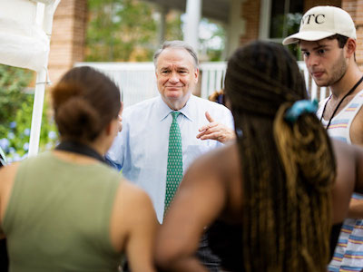 President Fitts talks with students at Front Porch Festival