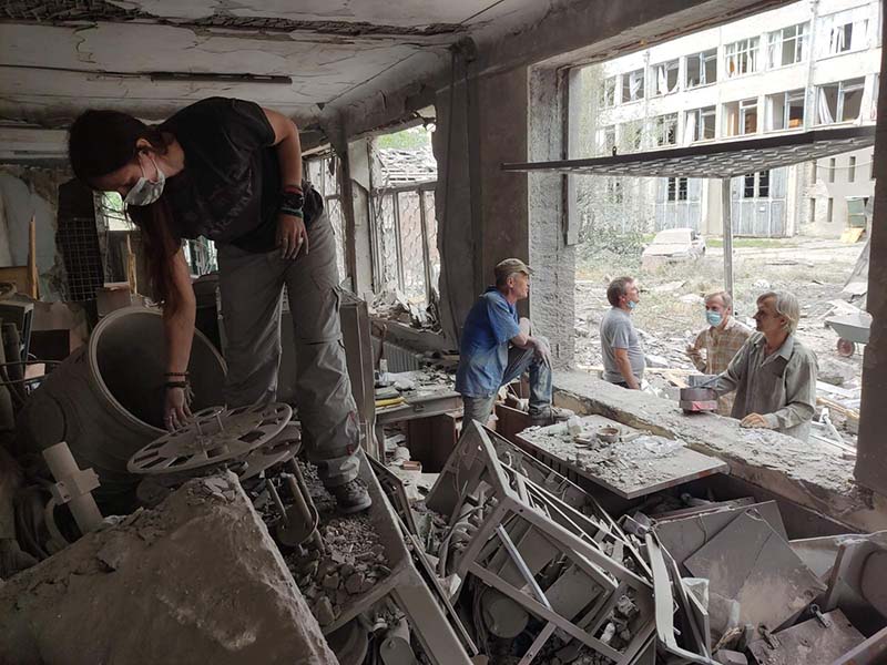 “In spite of everything, Ukrainian science continues to live,” says Ukrainian physicist Kseniia Minakova, pictured sifting through remains of destroyed research labs at Kharkiv Polytechnic Institute.