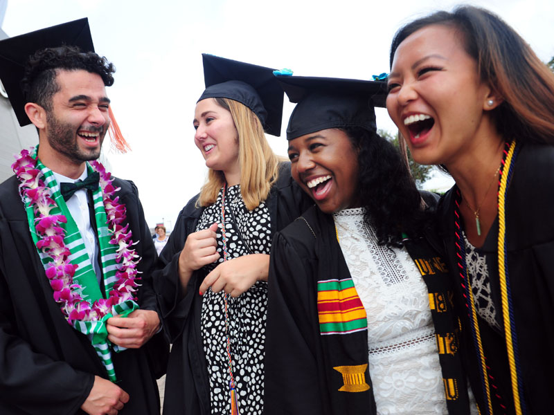 Four grads celebrate on Commencement day