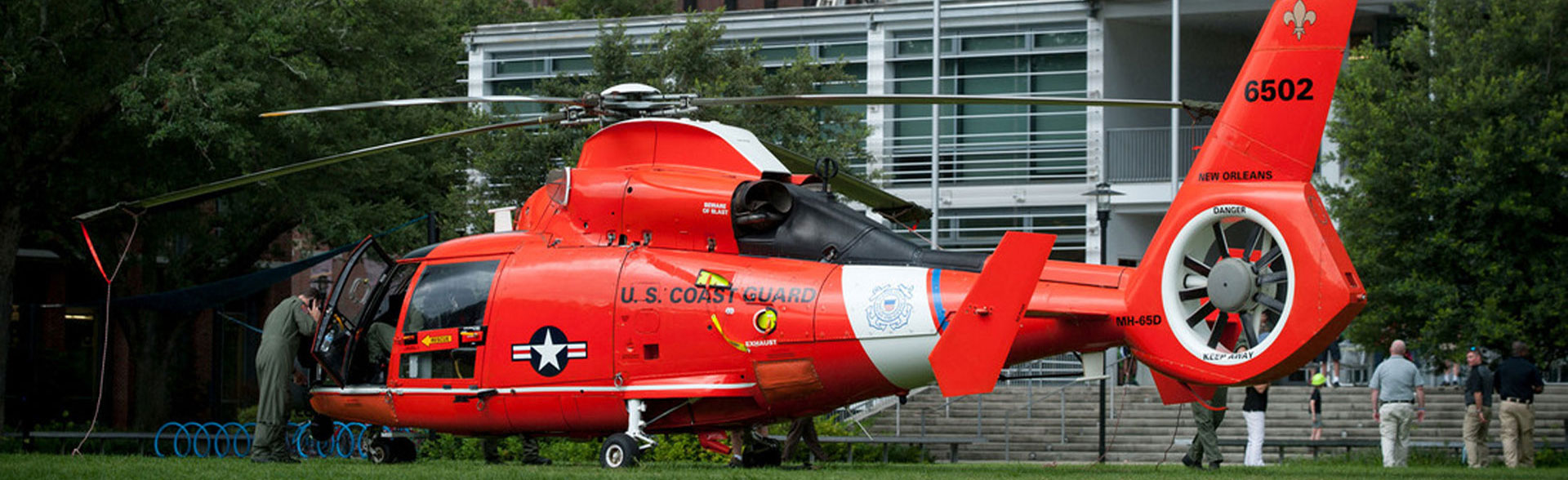 A U.S.Coast Guard helicopter lands on the LBC Quad on the uptown campus