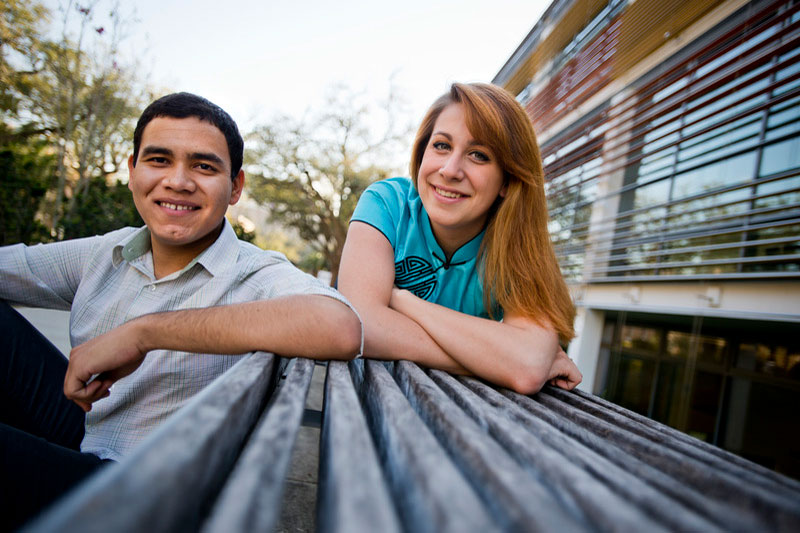 Student entrepeneur team pose on campus for photo