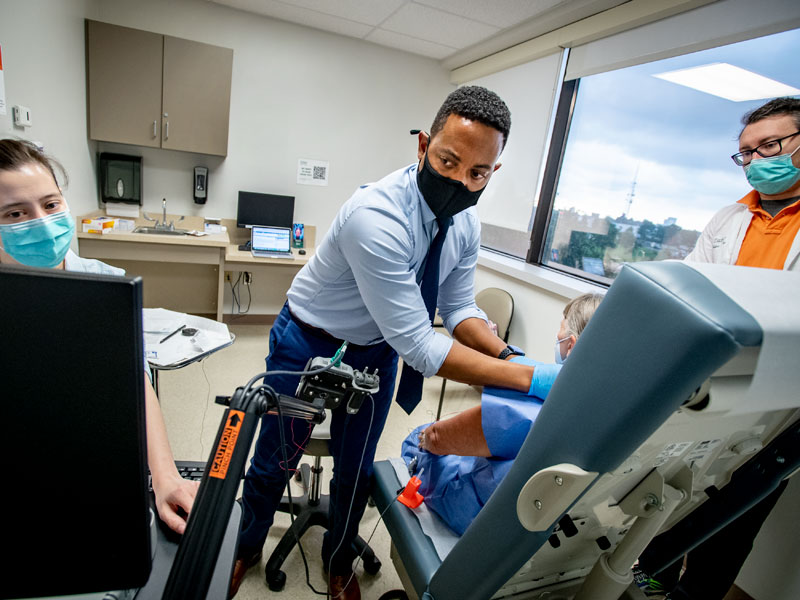 Sports medicine physician, Jacques Courseault, at the school of medicine