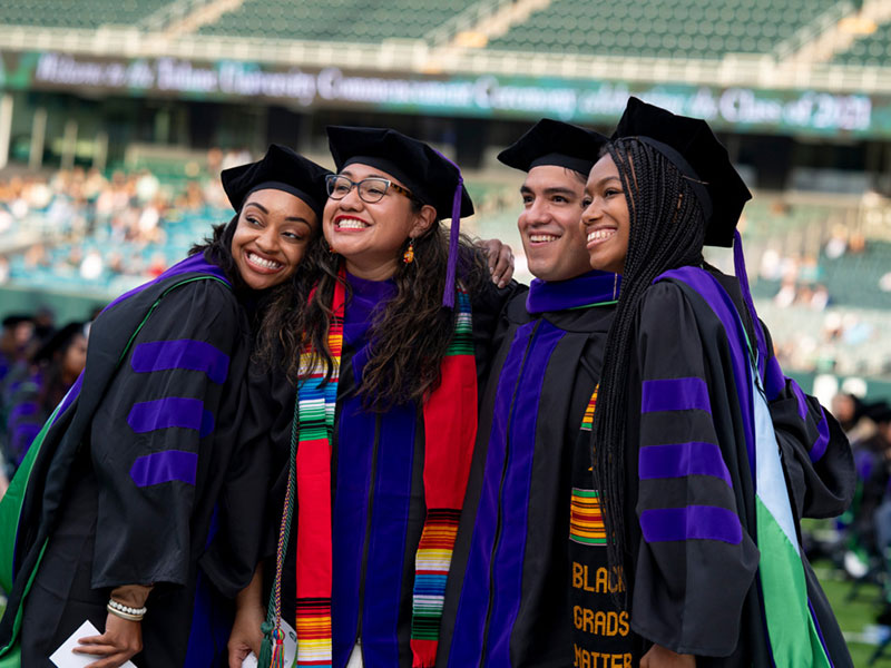 Law graduates pose for photo after Commencement