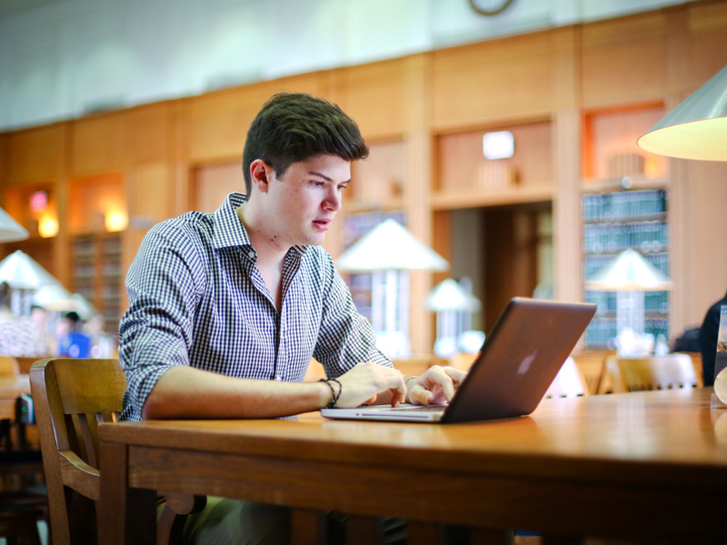 Student studying in the law library